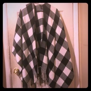 Black and white and red and black ponchos